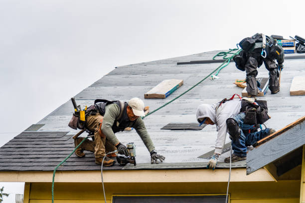 Professional Gutter Installation technician working in Winfield, KS